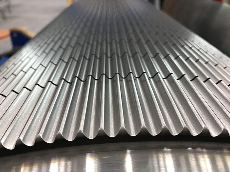 The fluting paper passes through corrugating rollers to create the wavy, fluted structure. This step gives the board its strength and rigidity.