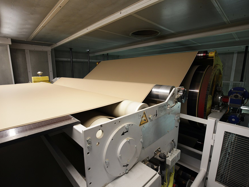 In the Glue machine, the fluted paper is glued between two flat linerboards using adhesive. This creates a single-faced corrugated sheet (2Ply), which can be further combined with another liner to form double-faced corrugated board (3Ply) or 5 and 7 layered corrugated board.